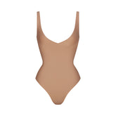SKIMS BODY UNLINED PLUNGE THONG BODYSUIT | SIENNA