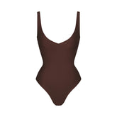 SKIMS BODY UNLINED PLUNGE THONG BODYSUIT | COCOA