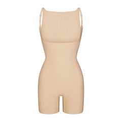 SKIMS BODY CORE SCULPT BACK SMOOTHING OPEN BUST MID THIGH BODYSUIT | SAND